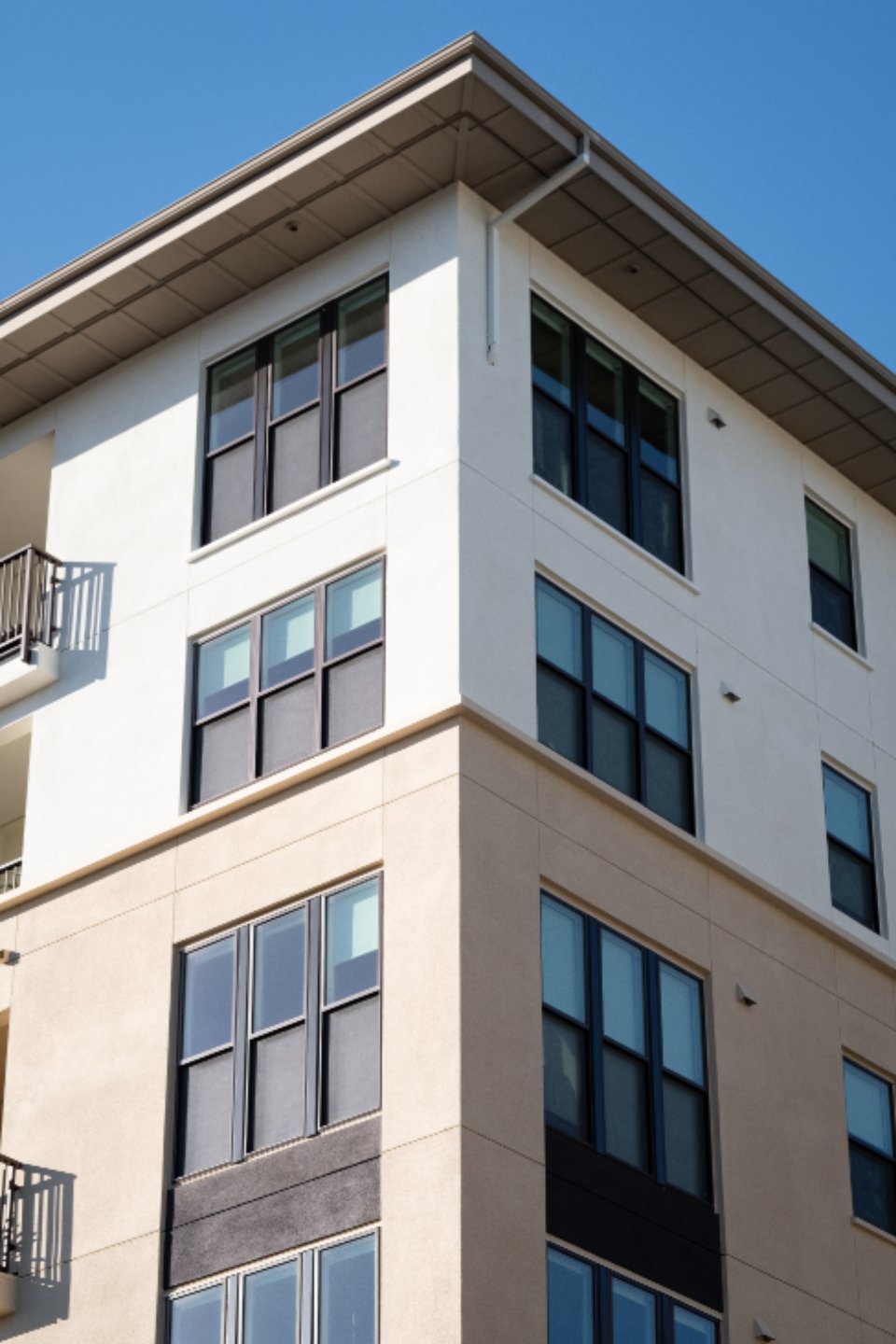 A modern apartment building exterior with balconies